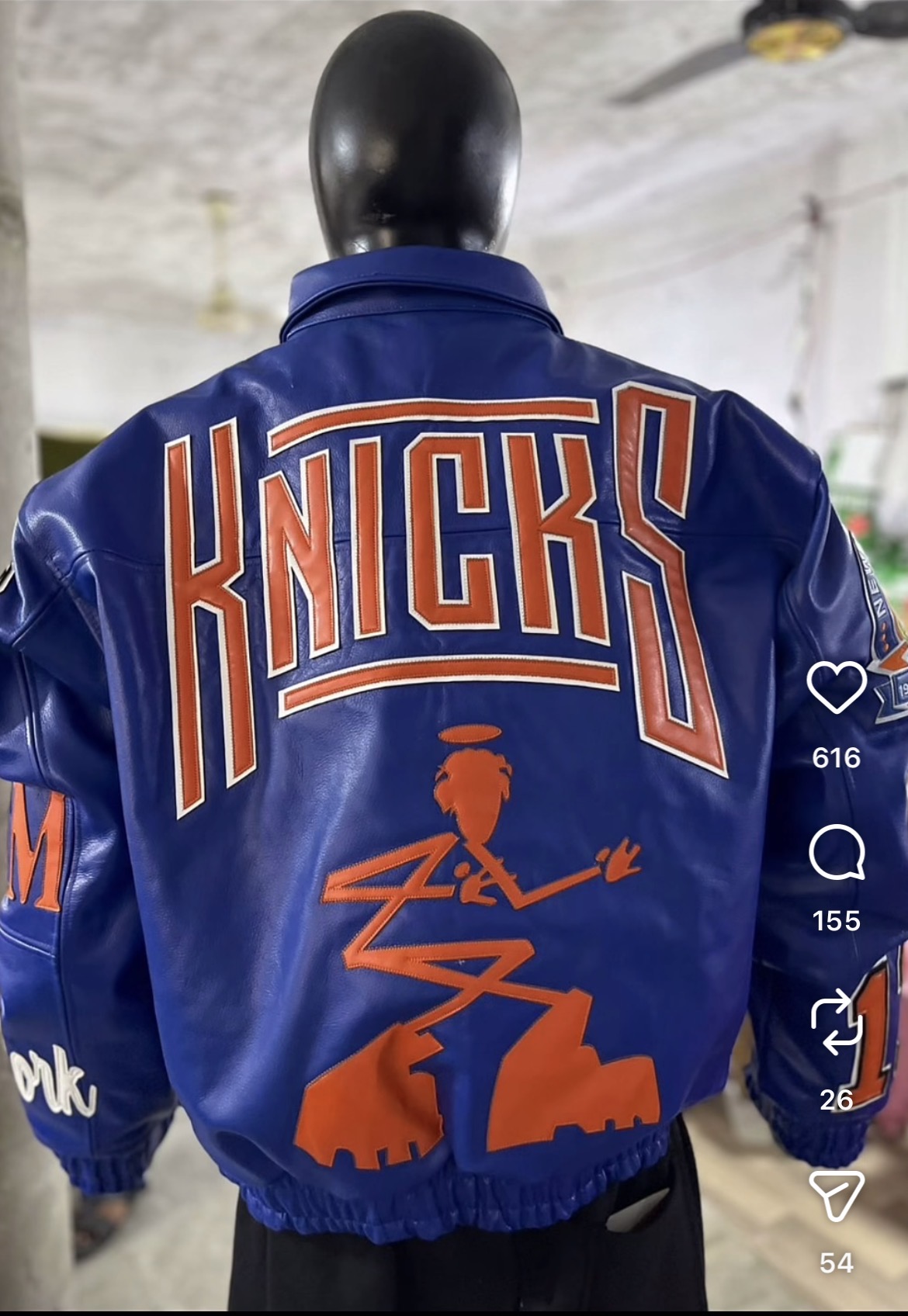 Custom embroidered Knicks leather jacket — back view